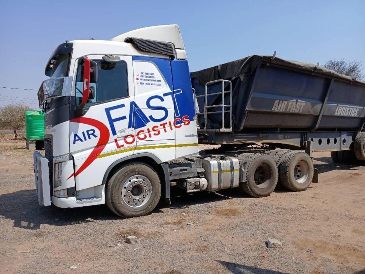 Air Fast Logistics side-tipper trailer working on a mine haul road